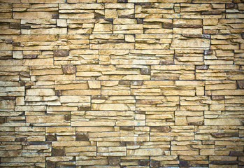 Grungy textured stone wall and floor inside old room interior