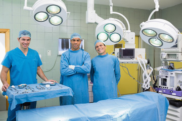 Wall Mural - Several Surgeons surrounding an operation table