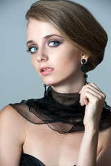 Beautiful woman with evening make-up. Jewelry and Beauty. Fashio