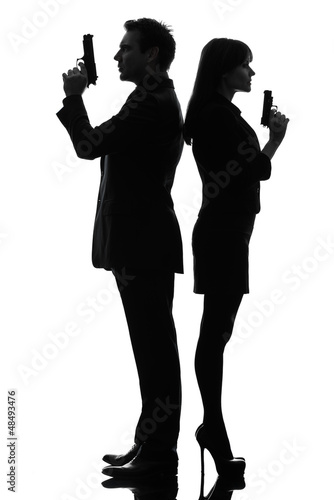 Cuadros en Lienzo couple woman man detective secret agent criminal silhouette