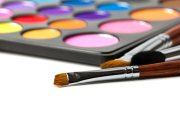 Wall Mural - Close-up of make-up brushes with colorful eyeshadow palette. 