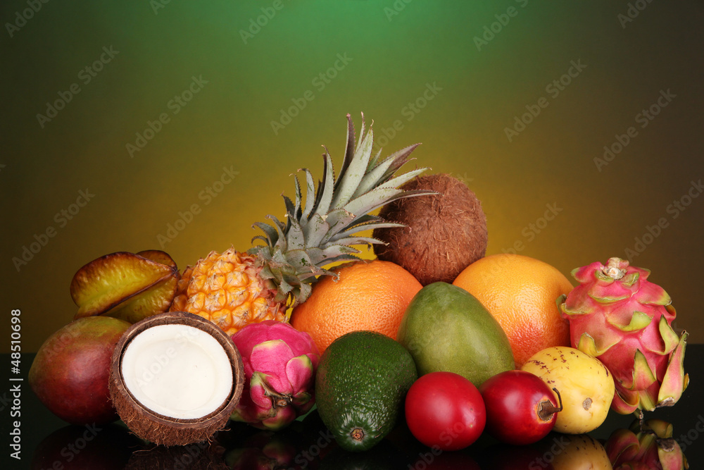 Composition of exotic fruits on colorful background
