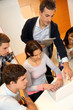 © goodluz - Group of students in computer training with teacher