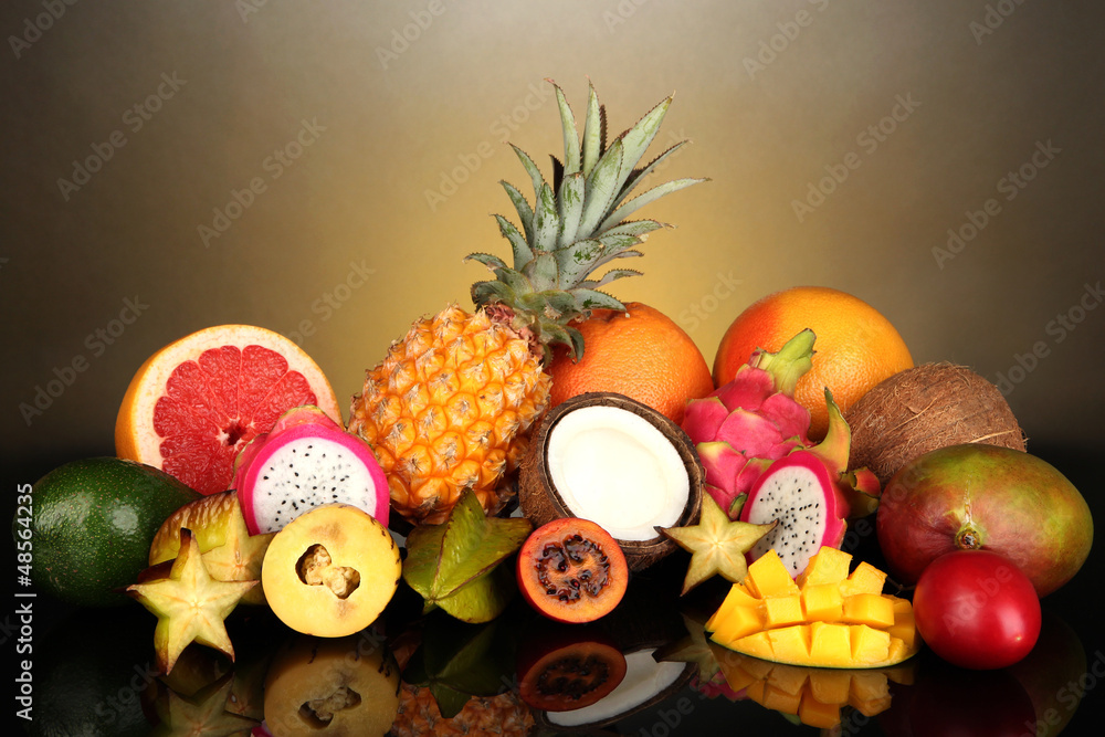 Composition of exotic fruits on colorful background