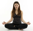 Young woman  with nose ring in Zen Yoga pose white background