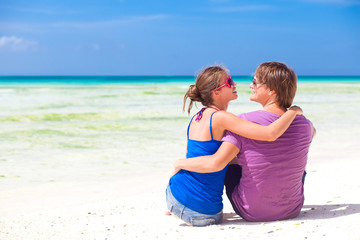 Wall Mural - young beautiful couple on tropical bali beach.honeymoon