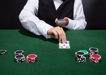 Croupier dealing cards