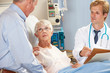 © Monkey Business - Doctor Talking To Senior Couple On Ward