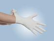 © Lovrencg - Pulling on surgical glove