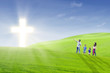 © Creativa Images - Christian family walk toward the light