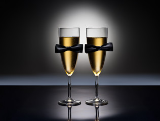 Champagne glasses with conceptual same sex decoration