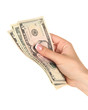 © Africa Studio - Female hand with dollars, close up, isolated on white