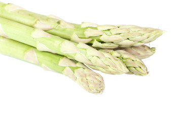 Fresh asparagus over a white background