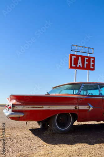 Fototapeta na wymiar Cafe Sign and Old Car on Route 66