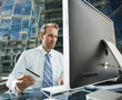 © Mike Kemp/Blend Images - Caucasian businessman shopping online