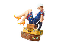 Young Woman Seat On Vintage Suitcases