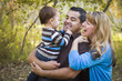 © Andy Dean - Happy Mixed Race Ethnic Family Playing In The Park