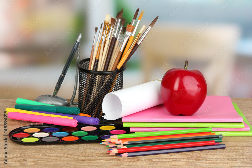 School supplies on wooden table