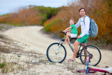 Poster - Father and daughter on a bike