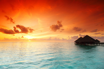 Canvas Print - maldivian houses on sunrise