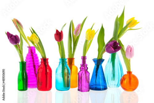 Obraz w ramie Colorful tulips in glass vases