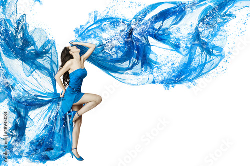 Obraz w ramie Woman dance in blue water dress dissolving in splash. Isolated w