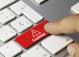 Wall Mural - cookies keyboard key. finger