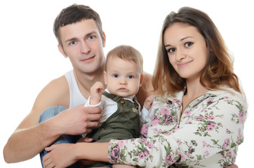 Wall Mural - Portrait of a young happy family with the kid