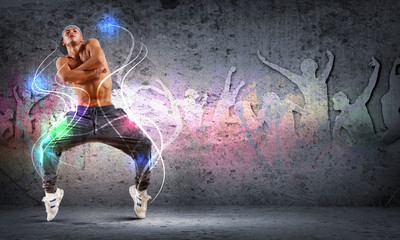 young man dancing hip hop with color lines