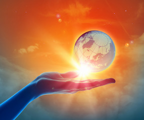 Wall Mural - image of earth planet on hand