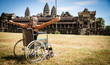 canvas print picture - Travel in Wheelchair to Angkor Wat