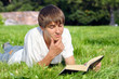 © Sabphoto - Teenager Reads a Book