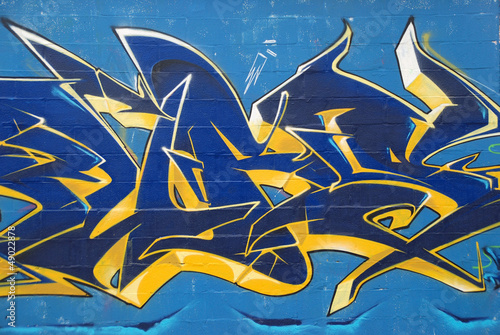 GRAFITI ARTÃ STICO CON LETRAS DE COLOR AZUL Y FONDO AZUL - Fototapeten Graffiti - FIXAR.de