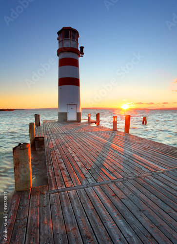 Plakat na zamówienie Lighthouse at Lake Neusiedl at sunset - Austria