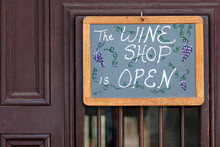 Open Sign On Wine Shop Door In St Augustine, Florida