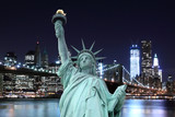 Fototapeta Miasta - Brooklyn Bridge and The Statue of Liberty at Night