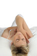 © auremar - a woman lying in a bed