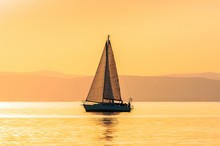 Sailing Boats With A Beautiful Sunset