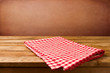 © maglara - Retro background with wooden table and tablecloth