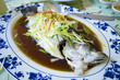 Marinated steamed fish with onion and ginger