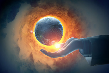 Wall Mural - Image of earth planet on hand