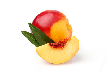 Poster - With a slice of peach and leaves. isolated on a white background