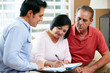 © Monkey Business - Financial Advisor Talking To Senior Couple At Home