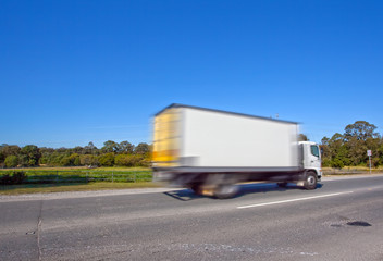 Canvas Print - Trucks traveling on the highway