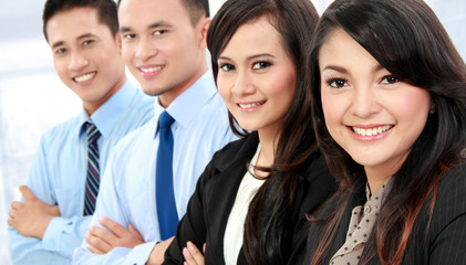 portrait of office workers smiling