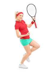 Poster - Full length portrait of a happy female tennis player