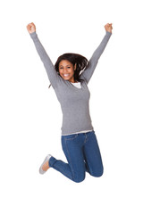 Portrait Of Excited Young Woman Jumping