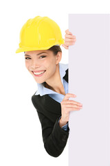 Wall Mural - Engineer entrepreneur business woman showing sign