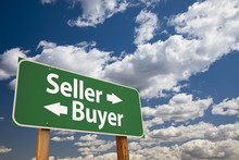 Seller, Buyer Green Road Sign Over Clouds