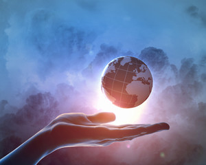 Wall Mural - image of earth planet on hand